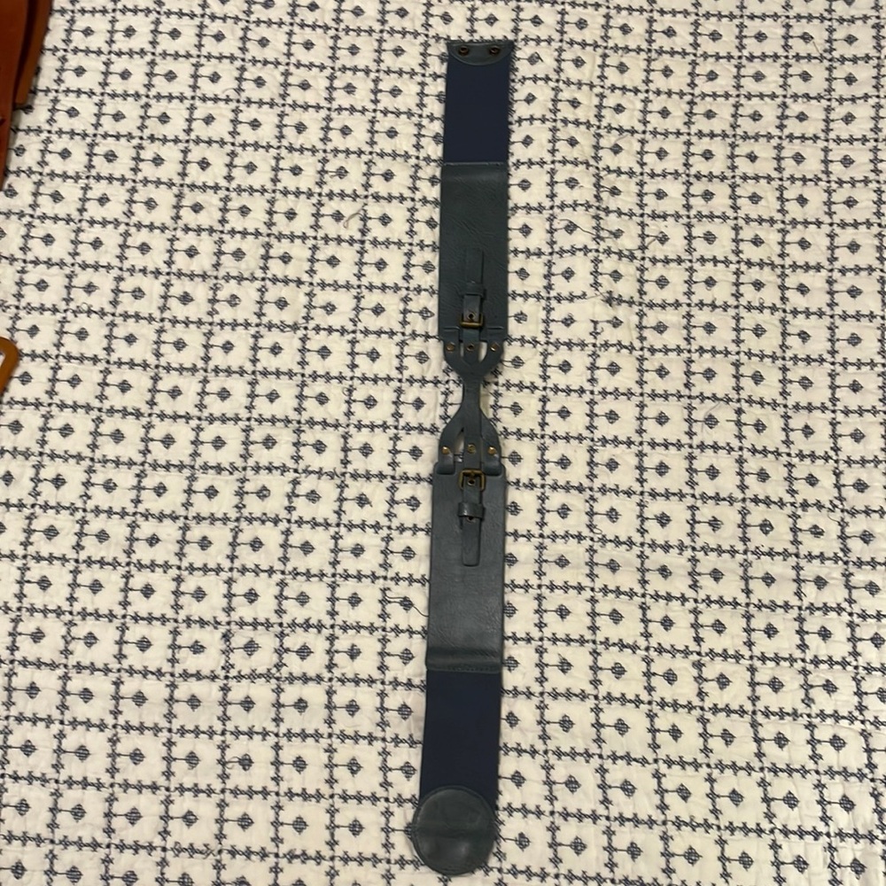 Blue leather and elastic belt size medium. Great condition.